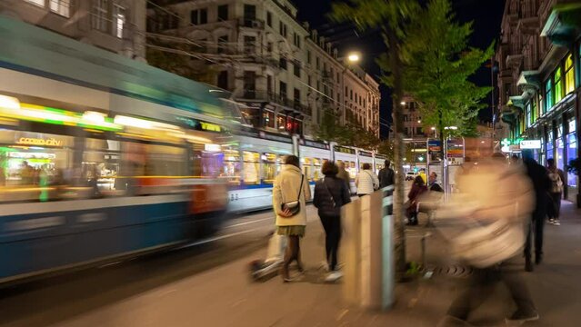 night illumination zurich city center traffic street walking pov panorama 4k timelapse switzerland