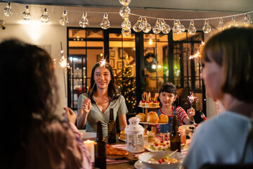 Multi-ethnic big family having fun, enjoy party outdoors in the garden. 