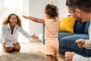 Fototapeta premium Caucasian family spending leisure free time together indoors in house. 