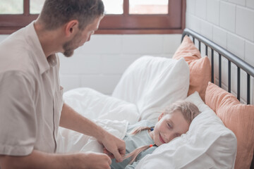 Fototapeta premium Father singing his daughter to sleep, providing comfort, support, and security. Focusing on fulfilling both physical and emotional needs. Kids sometimes act happy while pretending to fall asleep.