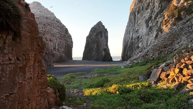 Large rocks natural monument Piedra de Iglecia Church stone on Chilean coast in Constitucion in sunset