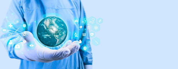 world health day concept. The doctor's hand holds the globe isolated on a celestial background....