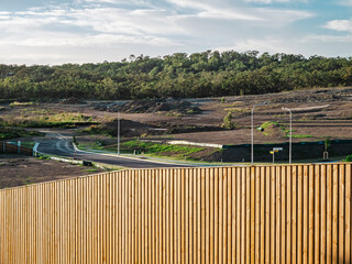 Wooden fence in front of unfinished residential development in Gladstone, Queensland