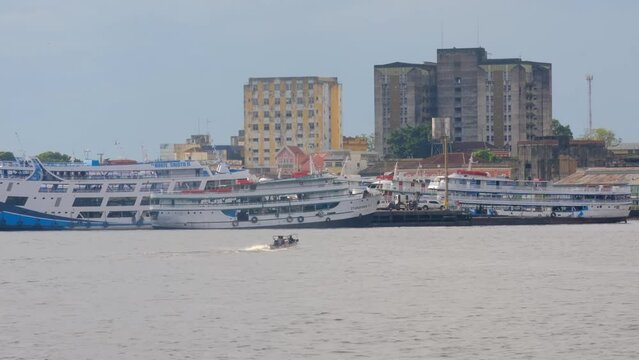 Manaus Brazil capital city of amazon state in the rio amazonia rainforest boat dock port and buildings 