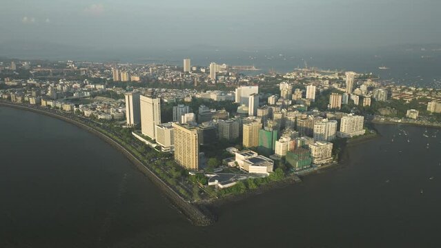 Aerial pullback from Nariman Point, Business headquartes skyscrapers in Mumbai Peninsula, India 