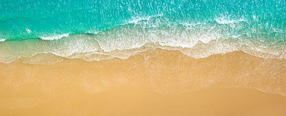 Fototapeta na wymiar Top view aerial image from drone of an stunning beautiful sea landscape beach with turquoise water with copy space for your text.Beautiful Sand beach with turquoise water,aerial UAV drone shot