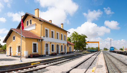 Old little yellow train station in countryside - Anatolia, Turkey