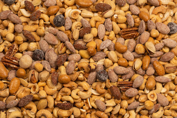 A group of almonds, pistachios, walnuts, macadamia, cashews.