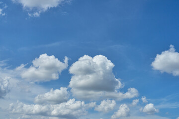 Naklejka na ściany i meble The white fluffy cloud and blue sky
