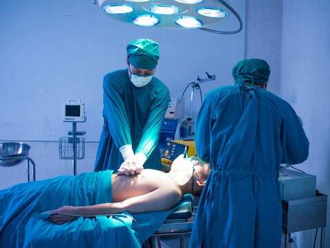 Hospital operation room emergency cpr pump heart help rate aid health care cancer treatment surgery unconscious help hope assistance rescue doctor nurse staff surgeon accident hurry teamwork medical  - Powered by Adobe