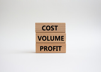 Cost Volume Profit symbol. Concept word Cost Volume Profit on wooden blocks. Beautiful white background. Business and Cost Volume Profit concept. Copy space