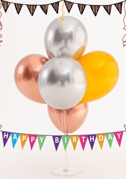 Composite of happy birthday text with colorful buntings and balloons on white background, copy space