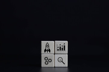 A wooden block showing a rocket icon. This is the beginning of a new generation of Entrepreneurs,...