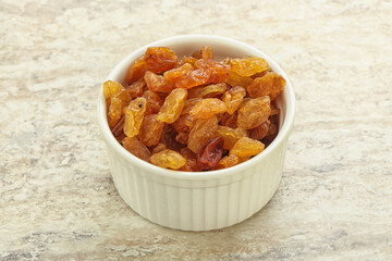 Sweet yellow raisin in the bowl