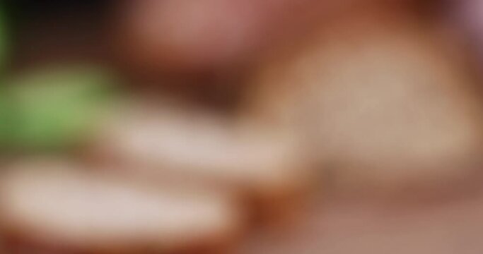 focus on pieces of soft fresh bread with the addition of various grains and cereals, close-up of soft multi-grain bread