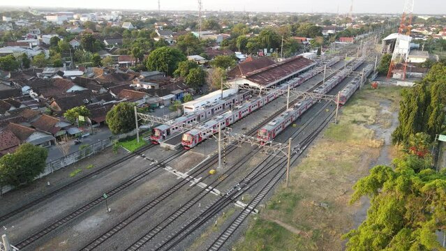 Aerial view of KRL Train in Klaten Train Station in the evening.