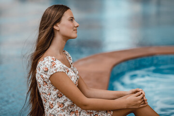 Attractive girl on the beach resort