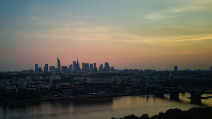 Fototapeta na wymiar City panorama, Warsaw skyline with at beautiful sunset clouds..