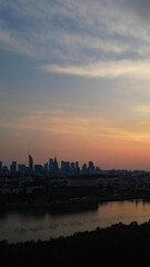 City panorama, Warsaw skyline with at beautiful sunset clouds..