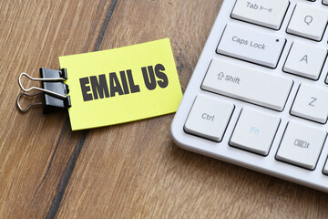 Email Us text on card, concept background