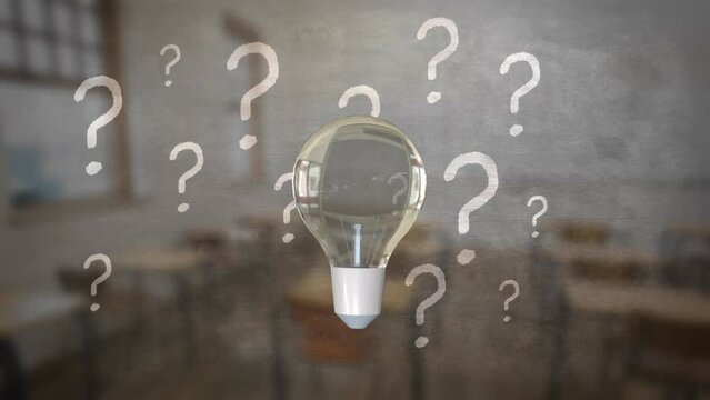 Animation of light bulb and question marks over class room background