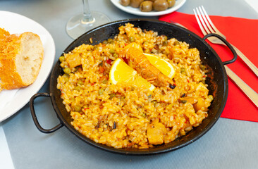 Paella with seafood - traditional Spanish dish. High quality photo