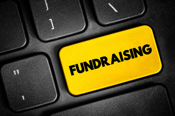 Fundraising - process of seeking and gathering voluntary financial contributions, text button on keyboard