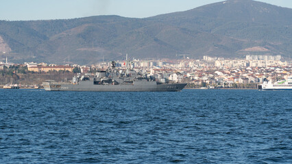 Fototapeta premium Turkish battleship. TCG Fatih (F-242) frigate patrol in Gulf of Izmit. Turkish naval force. Kocaeli, Turkey, June 21, 2023.