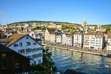 Fototapeta na wymiar Picturesque Buildings of Zurich Old Town by Limmat River - View from Lindenhof Park