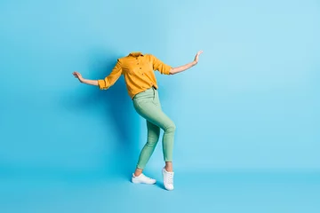  Creative abstract composite photo template collage of unusual weird headless woman dancing enjoy music isolated on blue color background © deagreez