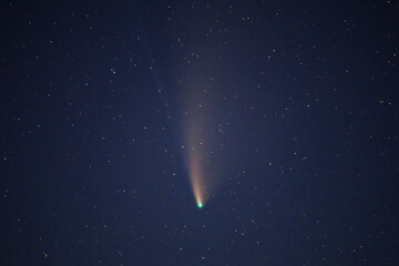 closeup comet on the night starry sky background