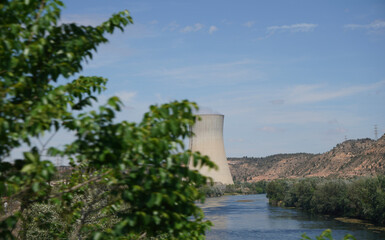Fototapeta na wymiar Nuclear power plant on the Rio Ebro in Spain with a cooling tower in a nice landscape