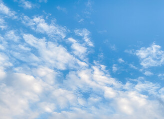 Obraz premium Sky and fluffy cloud scenery in the morning is incredibly calming to start the day,sky and fluffy white cloud made me feel relaxed,sky and fluffy cloud scenery take a majestic and breathtaking beauty