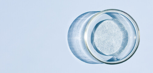petri dish with transparent helium serum