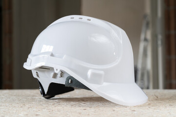 Hard hat safety helmet, used in industrial workplace. Worker head protection from injury on a...