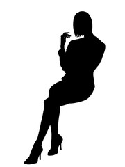 座る女性のシルエット