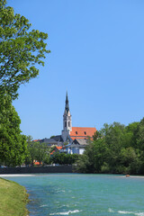 View at river Isar in Bad Tölz with the Church of the Assumption of Mary (Mariä Himmelfahrt) in...