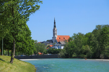 View at river Isar in Bad Tölz with the Church of the Assumption of Mary (Mariä Himmelfahrt) in...