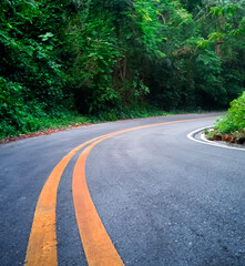curvy road. Curvy road in the forest.