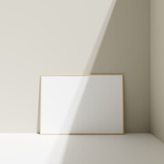 Poster photo frame mockup leanings against the pastel wall on the floor with shadow