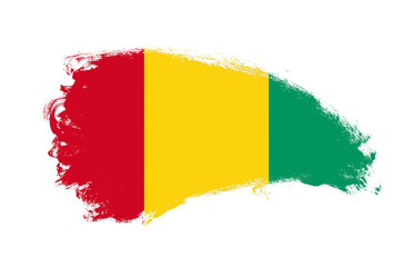 Obraz premium National flag of Guinea painted with stroke brush on isolated white