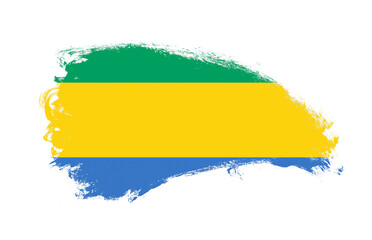 Obraz premium National flag of Gabon painted with stroke brush on isolated white
