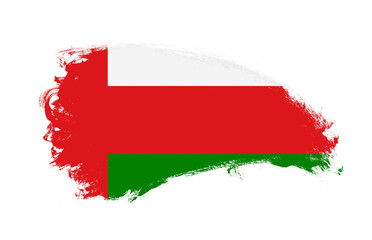 National flag of Oman painted with stroke brush on isolated white