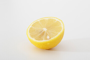 Naklejka na ściany i meble Lemon is a fruit, tart and sweet, yellow and green