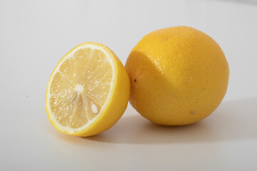 Lemon is a fruit, tart and sweet, yellow and green