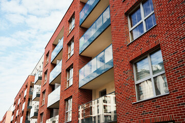 Modern residential complex in Gdansk, Poland. Living house facade with balconies. Apartment building. Mortgage in real estate