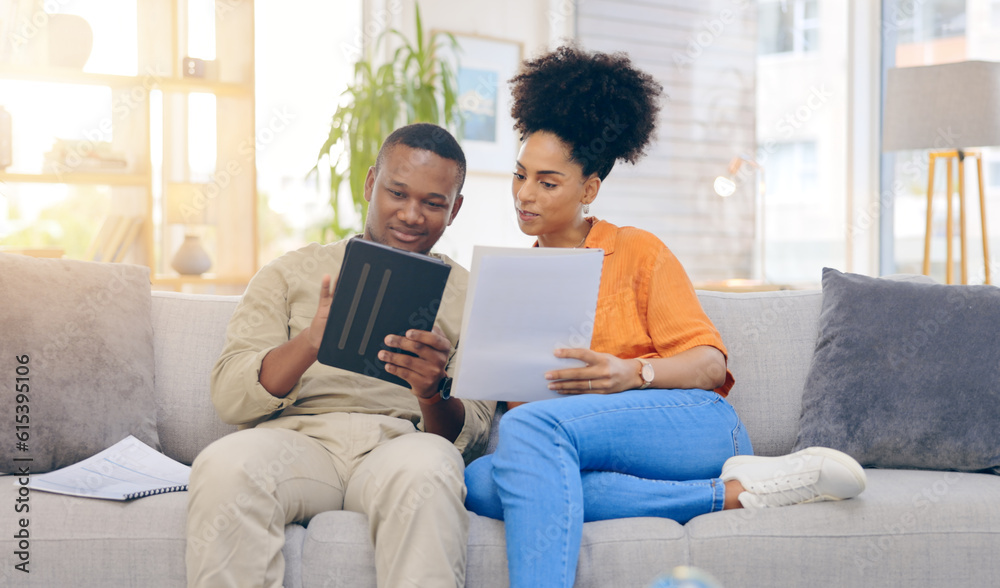 Sticker Tablet,documents, smile and couple on sofa in home living room, bonding and online shopping. Interracial, technology and happy black man and woman relax on social media, internet browsing or web scro