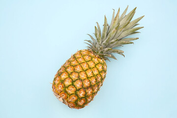 Delicious ripe pineapple on white background, top view. Exotic fruit