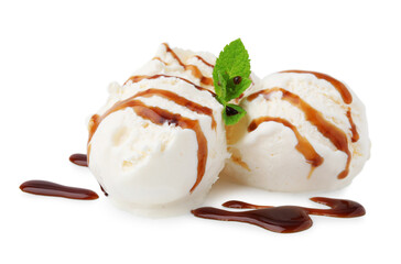 Scoops of ice cream with caramel sauce and mint isolated on white
