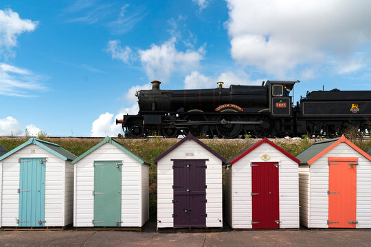 Steam train at Goodrington Beach Huts, Paignton, Devon, UK
